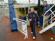 26 June 2004; Galway midfielder Fergal Healy and manager Conor Hayes make their way onto the team bus after crossing Strangford lLough on the strangford ferry on their way to the game. Guinness Senior Hurling Championship Qualifier, Round 1, Down v Galway, McKenna Park, Ballycran, Co. Down. Picture credit; Brendan Moran / SPORTSFILE