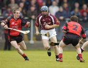 26 June 2004; Damien Hayes, Galway, in action against Andy Savage, left, and Liam Clarke, Down. Guinness Senior Hurling Championship Qualifier, Round 1, Down v Galway, McKenna Park, Ballycran, Co. Down. Picture credit; Brendan Moran / SPORTSFILE
