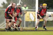 26 June 2004; Down players, from left, Gary Savage, Graham Clarke, Gabriel Clarke and Michael Braniff, defend their goal against a free. Guinness Senior Hurling Championship Qualifier, Round 1, Down v Galway, McKenna Park, Ballycran, Co. Down. Picture credit; Brendan Moran / SPORTSFILE