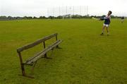 26 June 2004; Galway player David Tierney pucks around in the warm-up in front of an old bench which was used by the teams to sit on for the team photographs. Guinness Senior Hurling Championship Qualifier, Round 1, Down v Galway, McKenna Park, Ballycran, Co. Down. Picture credit; Brendan Moran / SPORTSFILE