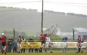 26 June 2004; Stephen Clarke (15), Down, contests a dropping ball with Galway goalkeeper Liam Donoghue. Guinness Senior Hurling Championship Qualifier, Round 1, Down v Galway, McKenna Park, Ballycran, Co. Down. Picture credit; Brendan Moran / SPORTSFILE