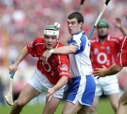 27 June 2004; Garvan McCarthy, Cork, in action against Brian Phelan, Waterford. Guinness Munster Senior Hurling Championship Final, Cork v Waterford, Semple Stadium, Thurles, Co. Tipperary. Picture credit; Ray McManus / SPORTSFILE