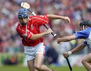 27 June 2004; Tom Kenny, Cork, in action against Waterford's James Murray. Guinness Munster Senior Hurling Championship Final, Cork v Waterford, Semple Stadium, Thurles, Co. Tipperary. Picture credit; Ray McManus / SPORTSFILE
