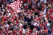 27 June 2004; Cork fans pictured during the game. Guinness Munster Senior Hurling Championship Final, Cork v Waterford, Semple Stadium, Thurles, Co. Tipperary. Picture credit; Ray McManus / SPORTSFILE