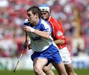 27 June 2004; Brian Phelan, Waterford, in action against Garvan McCarthy, Cork. Guinness Munster Senior Hurling Championship Final, Cork v Waterford, Semple Stadium, Thurles, Co. Tipperary. Picture credit; Ray McManus / SPORTSFILE