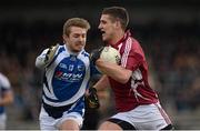 10 March 2013; Denis Corroon, Westmeath, in action against MJ Tierney, Laois. Allianz Football League, Division 2, Westmeath v Laois, Cusack Park, Mullingar, Co. Westmeath. Picture credit: Brendan Moran / SPORTSFILE