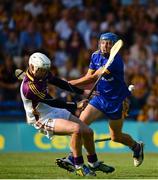 13 July 2013; Pádraic Collins, Clare, in action against Mark Fanning, Wexford. GAA Hurling All-Ireland Senior Championship, Phase III, Clare v Wexford, Semple Stadium, Thurles, Co. Tipperary. Picture credit: Ray McManus / SPORTSFILE