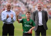 21 July 2013; Anthony Finnerty representing his father former Mayo star Anthony Finnerty who was honoured when the Mayo Teams of 1988 & 1989 introduced to the Crowd during half time at the Connacht GAA Football Senior Championship Final.  Elverys MacHale Park, Castlebar, Co. Mayo. Picture credit: Ray McManus / SPORTSFILE