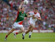 25 August 2013; Keith Higgins, Mayo, in action against Darren McCurry, Tyrone. GAA Football All-Ireland Senior Championship Semi-Final, Mayo v Tyrone, Croke Park, Dublin. Picture credit: Ray McManus / SPORTSFILE