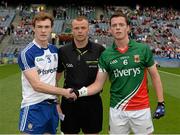 25 August 2013; Mayo captain Stephen Coen, right, and Monaghan captain Kevin Loughran shake hands in front of referee Anthony Nolan. Electric Ireland GAA Football All-Ireland Minor Championship Semi-Final, Mayo v Monaghan, Croke Park, Dublin. Picture credit: Ray McManus / SPORTSFILE