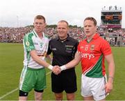 21 July 2013; Mayo captain Andy Moran and London captain Seamus Hannon shake hands in front of referee Conor Lane. Connacht GAA Football Senior Championship Final, Mayo v London, Elverys MacHale Park, Castlebar, Co. Mayo. Picture credit: Ray McManus / SPORTSFILE