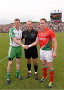 21 July 2013; Mayo captain Andy Moran, right, and London captain Seamus Hannon shake hands in front of referee Conor Lane. Connacht GAA Football Senior Championship Final, Mayo v London, Elverys MacHale Park, Castlebar, Co. Mayo. Picture credit: Ray McManus / SPORTSFILE
