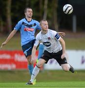 30 August 2013; Chris Shields, Dundalk, in action against Robert Benson, UCD. Airtricity League Premier Division, UCD v Dundalk, UCD Bowl, Belfield, Dublin. Picture credit: Matt Browne / SPORTSFILE