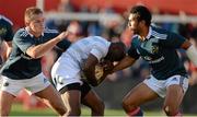 30 August 2013; Topsy Ojo, London Irish, is tackled by Cian Bohane, left, and Casey Laulala, Munster. Pre-Season Friendly, Munster v London Irish, Musgrave Park, Cork. Picture credit: Diarmuid Greene / SPORTSFILE