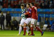 30 August 2013; Mark Quigley, Shamrock Rovers, is restrained by Shelbourne players Graham Gartland and Sean Brennan, right, after being sent off by referee Neil Doyle. Airtricity League Premier Division, Shelbourne v Shamrock Rovers, Tolka Park, Dublin. Photo by Sportsfile