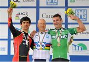 30 August 2013; Ireland's Colin Lynch, right, from Macclesfield, England, celebrates with his bronze medal after finishing third in the Men’s C2 TT 17.3km, in a time of 26:33.47, with winner Keith Aaron, centre, USA, and silver medallist Maurice Tio Eckhard, Spain. 2013 UCI Paracycling Road World Championships, Baie-Comeau, Québec, Canada. Picture credit: Jean Baptiste Benavent / SPORTSFILE