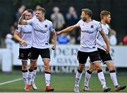 26 June 2023; Daniel Kelly of Dundalk, second from left, celebrates with team-mates after scoring his side's first goal during the SSE Airtricity Men's Premier Division match between Dundalk and St Patrick's Athletic at Oriel Park in Dundalk, Louth. Photo by Sam Barnes/Sportsfile