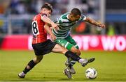 26 June 2023; Graham Burke of Shamrock Rovers in action against Adam O'Reilly of Derry City during the SSE Airtricity Men's Premier Division match between Shamrock Rovers and Derry City at Tallaght Stadium in Dublin. Photo by Stephen McCarthy/Sportsfile