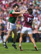 25 June 2023; Diarmuid O'Connor of Mayo, left, and Seán Fitzgerald of Galway jostle during the GAA Football All-Ireland Senior Championship Preliminary Quarter Final match between Galway and Mayo at Pearse Stadium in Galway. Photo by John Sheridan/Sportsfile
