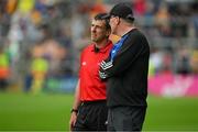 24 June 2023; Clare hurling manager Brian Lohan in conversation with linesman Paud O'Dwyer near the end of the GAA Hurling All-Ireland Senior Championship Quarter Final match between Clare and Dublin at TUS Gaelic Grounds in Limerick. Photo by Ray McManus/Sportsfile