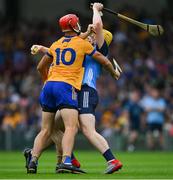 24 June 2023; Daire Gray of Dublin is tackled by Peter Duggan, 10, and Mark Rodgers of Clare during the GAA Hurling All-Ireland Senior Championship Quarter Final match between Clare and Dublin at TUS Gaelic Grounds in Limerick. Photo by Ray McManus/Sportsfile