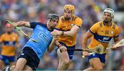 24 June 2023; Danny Sutcliffe of Dublin is tackled by David Fitzgerald and Aron Shanagher of Clare, right, during the GAA Hurling All-Ireland Senior Championship Quarter Final match between Clare and Dublin at TUS Gaelic Grounds in Limerick. Photo by Ray McManus/Sportsfile