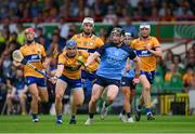 24 June 2023; Cian O'Sullivan of Dublin races clear of Rory Hayes of Clare during the GAA Hurling All-Ireland Senior Championship Quarter Final match between Clare and Dublin at TUS Gaelic Grounds in Limerick. Photo by Ray McManus/Sportsfile