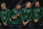 27 June 2023; Ireland players, from left, Niall Comerford, Jordan Conroy, Terry Kennedy and Jack Kelly celebrate after receiving their medals following the Men's Rugby Sevens final match between Ireland and Great Britain at the Henryk Reyman Stadium during the European Games 2023 in Krakow, Poland. Photo by David Fitzgerald/Sportsfile