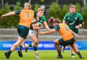 29 June 2023; Hugh Gavin of Ireland in action against Jack Barrett , left, and Max Craig of Australia during the U20 Rugby World Cup match between Australia and Ireland at Paarl Gymnasium in Paarl, South Africa. Photo by Thinus Maritz/Sportsfile