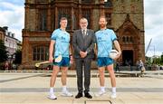 29 June 2023; Uachtarán Chumann Lúthchleas Gael Larry McCarthy, centre, with ambassadors Tipperary hurler Bryan O'Mara, left, and Derry footballer Conor Glass, during the FRS Recruitment GAA World Games launch at the Guildhall in Derry. Photo by Seb Daly/Sportsfile