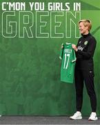 29 June 2023; Sinead Farrelly is presented with her jersey by Republic of Ireland manager Vera Pauw during a Republic of Ireland FIFA Women's World Cup 2023 squad announcement event at O'Reilly Hall in UCD, Dublin. Photo by Stephen McCarthy/Sportsfile