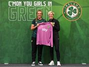 29 June 2023; Goalkeeper Grace Moloney is presented with her jersey by Republic of Ireland manager Vera Pauw during a Republic of Ireland FIFA Women's World Cup 2023 squad announcement event at O'Reilly Hall in UCD, Dublin. Photo by Stephen McCarthy/Sportsfile