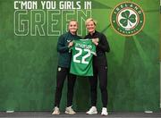 29 June 2023; Izzy Atkinson is presented with her jersey by Republic of Ireland manager Vera Pauw during a Republic of Ireland FIFA Women's World Cup 2023 squad announcement event at O'Reilly Hall in UCD, Dublin. Photo by Stephen McCarthy/Sportsfile