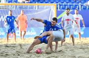 29 June 2023; Luca Bertacca of Italy is tackled by Sandro Spaccarotella of Switzerland during the Men's Beach Soccer group stages match between Italy and Switzerland at the Tarnów Beach Arena during the European Games 2023 in Poland.. Photo by Tyler Miller/Sportsfile