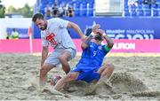 29 June 2023; Noel Ott of Switzerland in action against Emmanuele Zurlo of Italy during the Men's Beach Soccer group stages match between Italy and Switzerland at the Tarnów Beach Arena during the European Games 2023 in Poland.. Photo by Tyler Miller/Sportsfile
