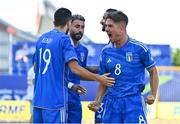 29 June 2023; Tommaso Fazzini of Italy, right, celebrates with teammates after scoring his side's first goal during the Men's Beach Soccer group stages match between Italy and Switzerland at the Tarnów Beach Arena during the European Games 2023 in Poland.. Photo by Tyler Miller/Sportsfile