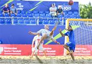29 June 2023; Glenn Hodel of Switzerland in action against Gianmarco Genovali of Italy during the Men's Beach Soccer group stages match between Italy and Switzerland at the Tarnów Beach Arena during the European Games 2023 in Poland.. Photo by Tyler Miller/Sportsfile