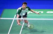 29 June 2023; Paul Reynolds of Ireland in action against Anders Skaarup Rasmussen and Kim Astrup of Denmark during the badminton Men's Doubles quarter final at the Jaskolka Arena during the European Games 2023 in Poland.. Photo by Tyler Miller/Sportsfile