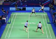 29 June 2023; Paul Reynolds, and Joshua Magee of Ireland, top, in action against Anders Skaarup Rasmussen and Kim Astrup of Denmark during the badminton Men's Doubles quarter final at the Jaskolka Arena during the European Games 2023 in Poland.. Photo by Tyler Miller/Sportsfile