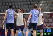 29 June 2023; Joshua Magee of Ireland, second from left, and teammate Paul Reynolds shake hands with Anders Skaarup Rasmussen, left, and Kim Astrup of Denmark after their defeat in the badminton Men's Doubles quarter final at the Jaskolka Arena during the European Games 2023 in Poland.. Photo by Tyler Miller/Sportsfile