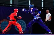 30 June 2023; Luke McCann of Ireland, right, in action against Richard Veres of Hungary in their Kickboxing Men's Point Fighting 63kg Quarter final bout at the Myslenice Arena during the European Games 2023 in Poland. Photo by Tyler Miller/Sportsfile