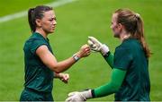 30 June 2023; Katie McCabe, left, and goalkeeper Courtney Brosnan during a Republic of Ireland women training session at UCD Bowl in Dublin. Photo by Stephen McCarthy/Sportsfile