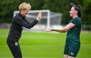 30 June 2023; Republic of Ireland manager Vera Pauw, left, with Lucy Quinn during a Republic of Ireland women training session at UCD Bowl in Dublin. Photo by Stephen McCarthy/Sportsfile