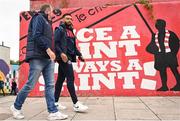30 June 2023; Jake Mulraney of St Patrick's Athletic speaks to supporter Paul Kelly before the SSE Airtricity Men's Premier Division match between St Patrick's Athletic and UCD at Richmond Park in Dublin. Photo by Stephen Marken/Sportsfile