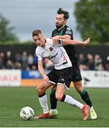 30 June 2023; Daniel Kelly of Dundalk is tackled by Richie Towell of Shamrock Rovers during the SSE Airtricity Men's Premier Division match between Dundalk and Shamrock Rovers at Oriel Park in Dundalk, Louth. Photo by Ben McShane/Sportsfile