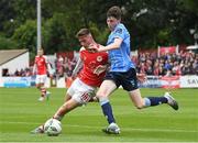 30 June 2023; Ben McCormack of St Patrick's Athletic in action against Jesse Dempsey of UCD during the SSE Airtricity Men's Premier Division match between St Patrick's Athletic and UCD at Richmond Park in Dublin. Photo by Stephen Marken/Sportsfile