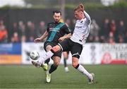 30 June 2023; Richie Towell of Shamrock Rovers is tackled by Hayden Muller of Dundalk during the SSE Airtricity Men's Premier Division match between Dundalk and Shamrock Rovers at Oriel Park in Dundalk, Louth. Photo by Ben McShane/Sportsfile