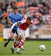 30 June 2023; Ben McCormack of St Patrick's Athletic in action against Michael Gallagher of UCD during the SSE Airtricity Men's Premier Division match between St Patrick's Athletic and UCD at Richmond Park in Dublin. Photo by Stephen Marken/Sportsfile