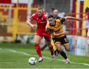 30 June 2023; Jordan McEneff of Derry City in action against Gavin Molloy of Shelbourne during the SSE Airtricity Men's Premier Division match between Shelbourne and Derry City at Tolka Park in Dublin. Photo by Michael P Ryan/Sportsfile