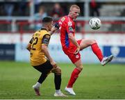 30 June 2023; Gavin Molloy of Shelbourne in action against Jordan McEneff of Derry City during the SSE Airtricity Men's Premier Division match between Shelbourne and Derry City at Tolka Park in Dublin. Photo by Michael P Ryan/Sportsfile